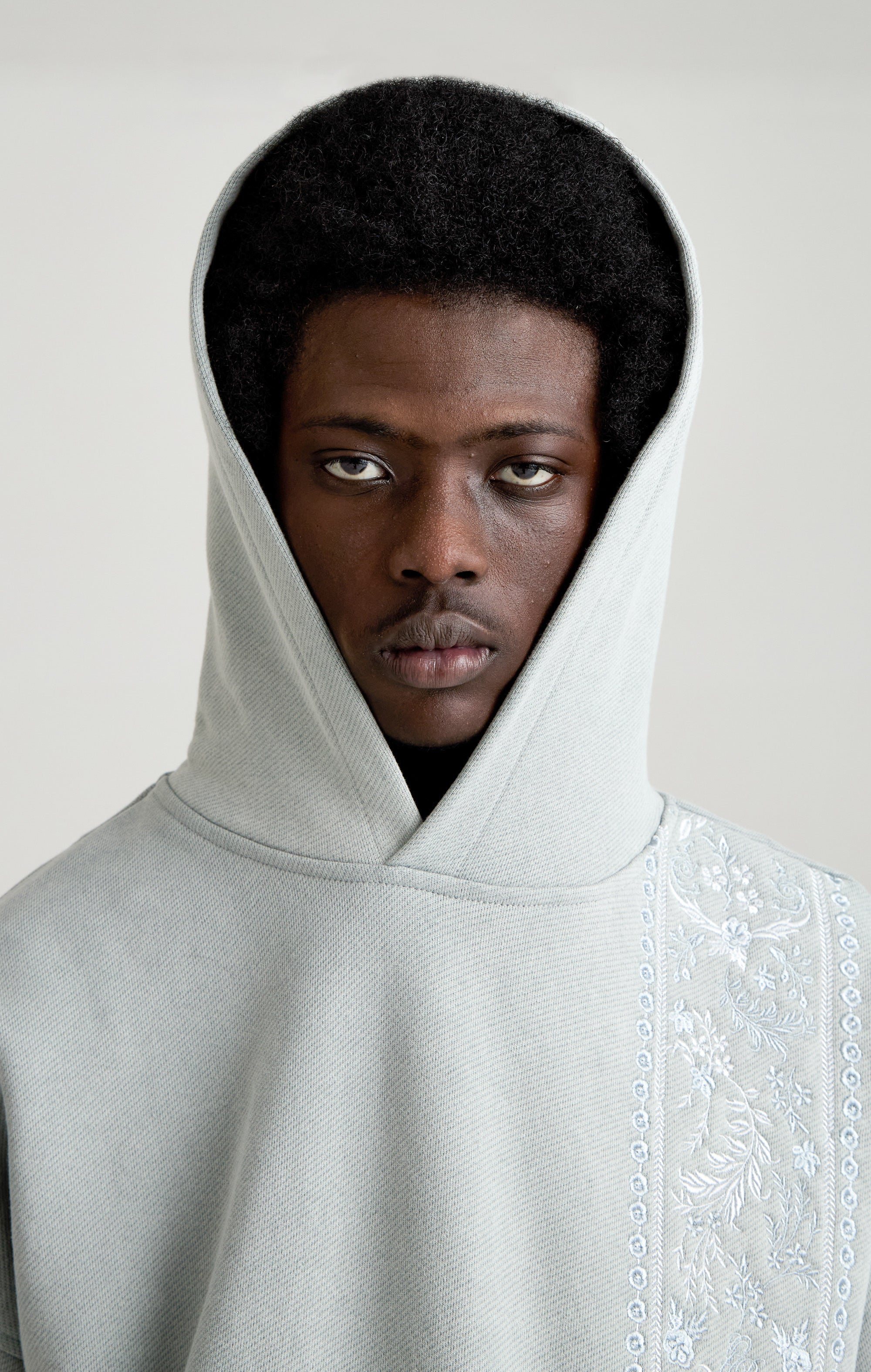 TAPESTRY IN GREY HOOD