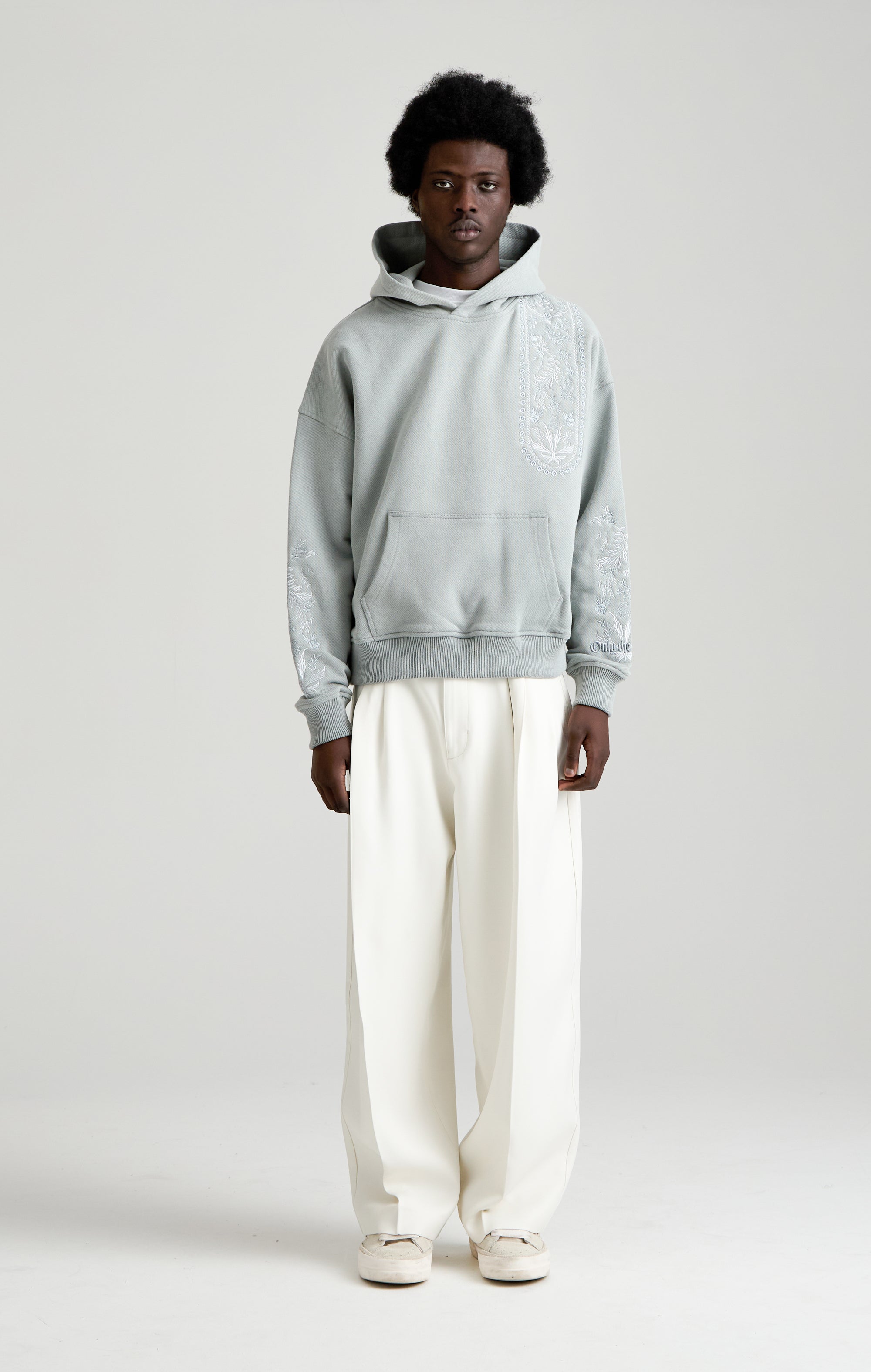 TAPESTRY IN GREY HOOD