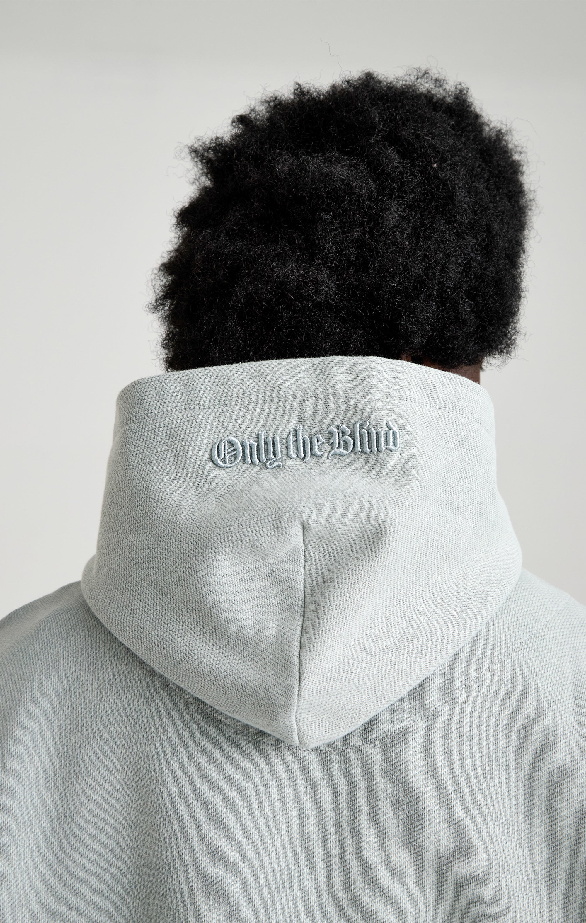 TAPESTRY IN GREY HOOD