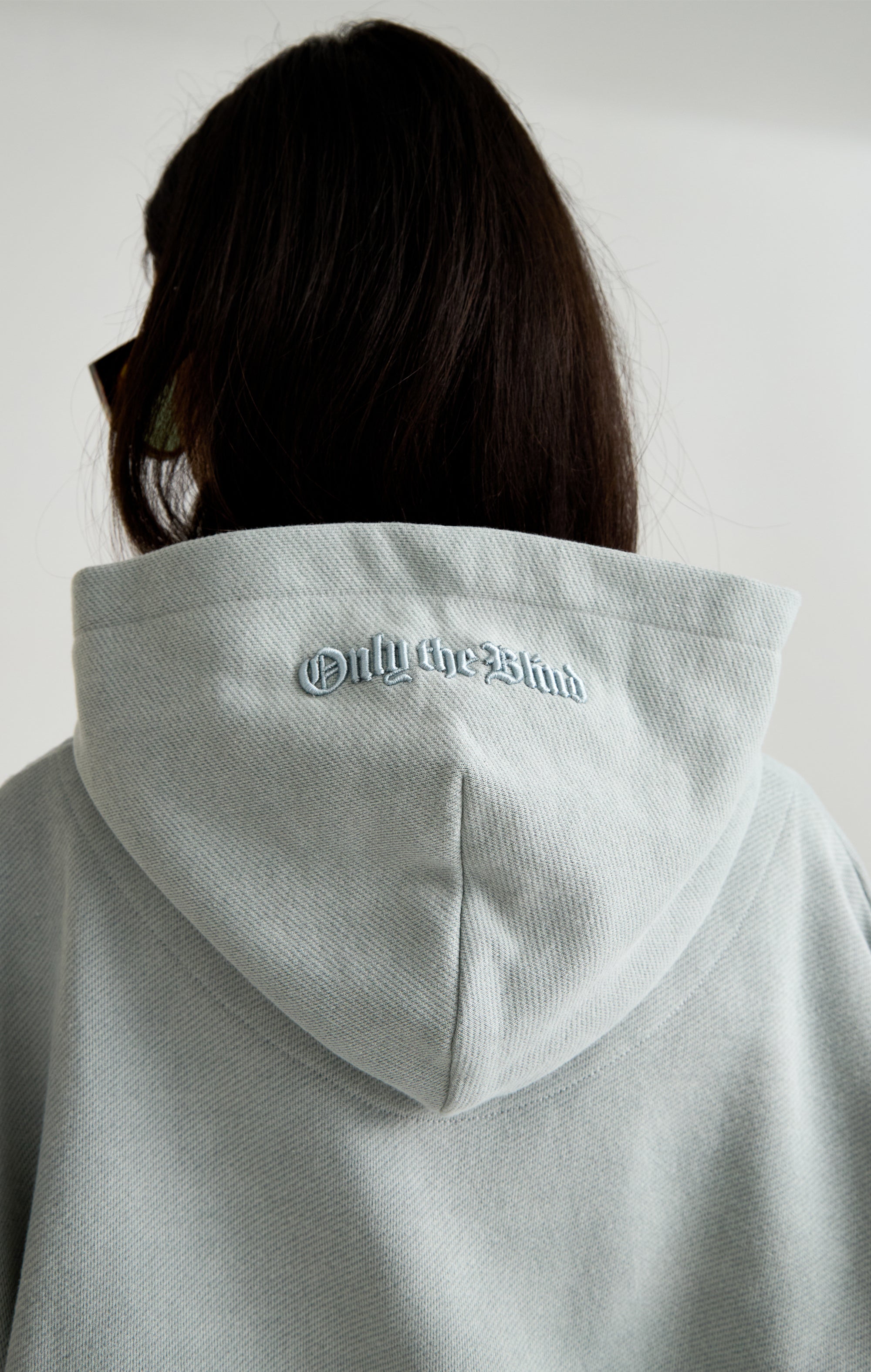 TAPESTRY IN GREY HOOD