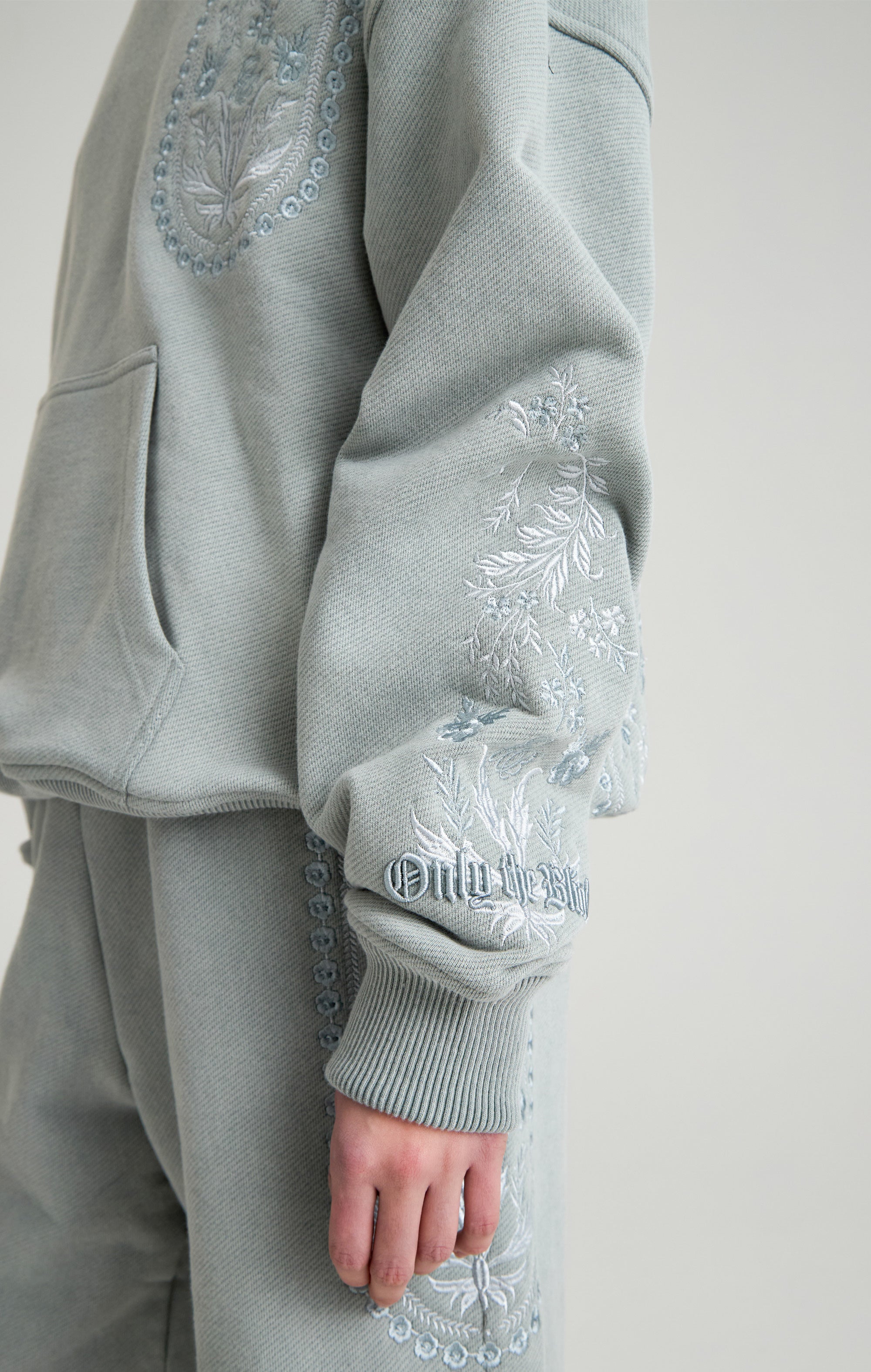 TAPESTRY IN GREY HOOD