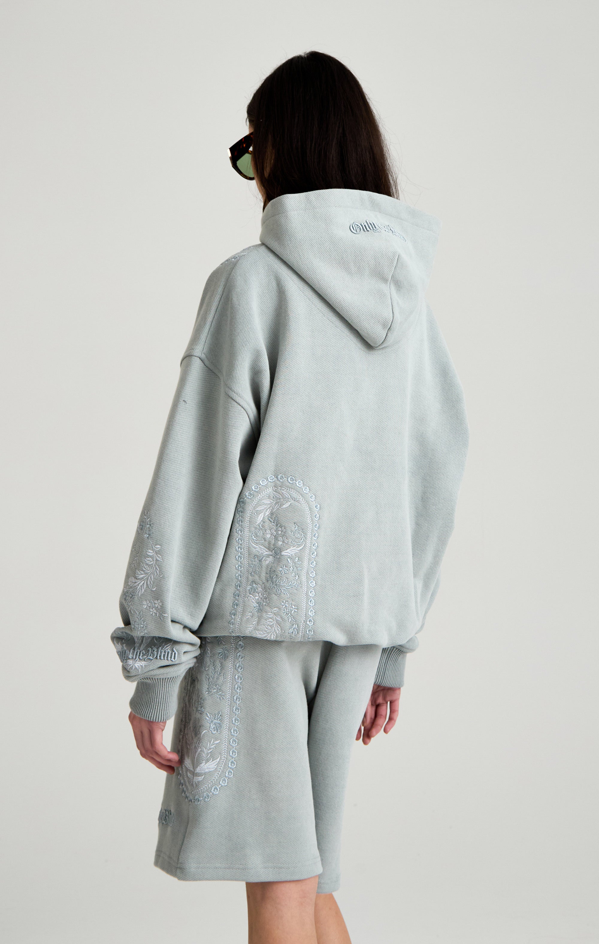 TAPESTRY IN GREY HOOD