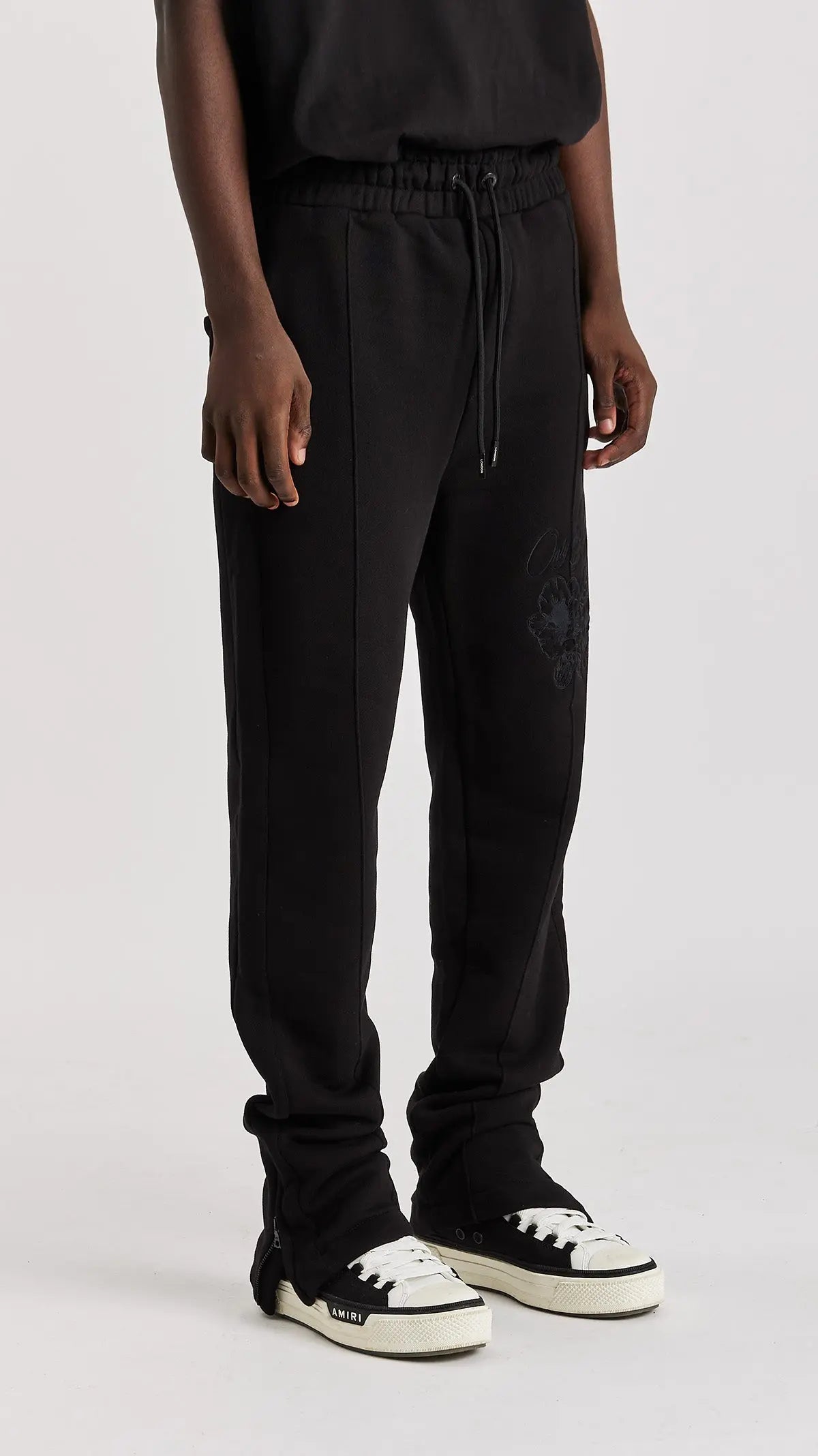 BLACK FLORAL SPLIT HEM SWEATPANTS