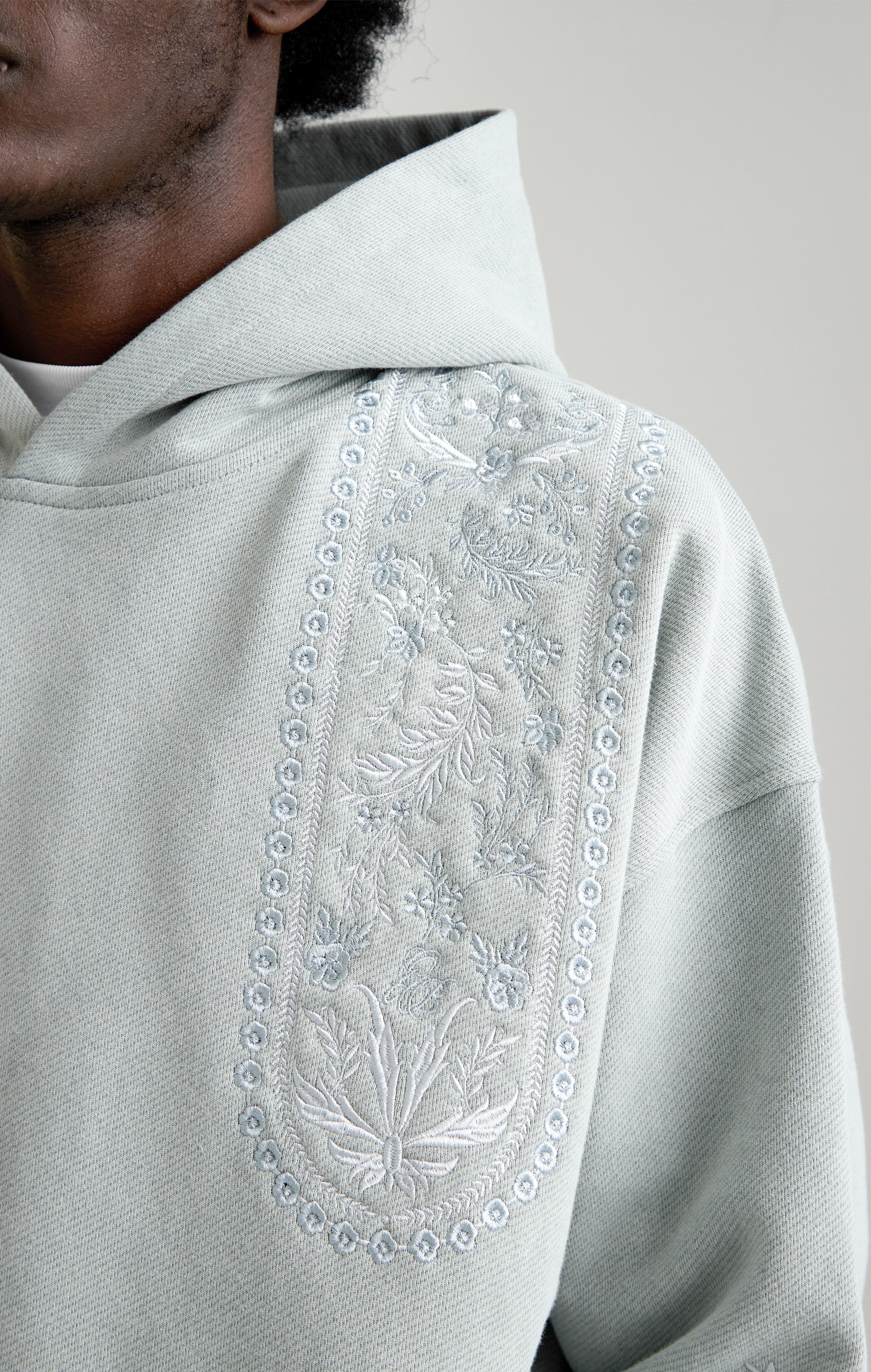 TAPESTRY IN GREY HOOD