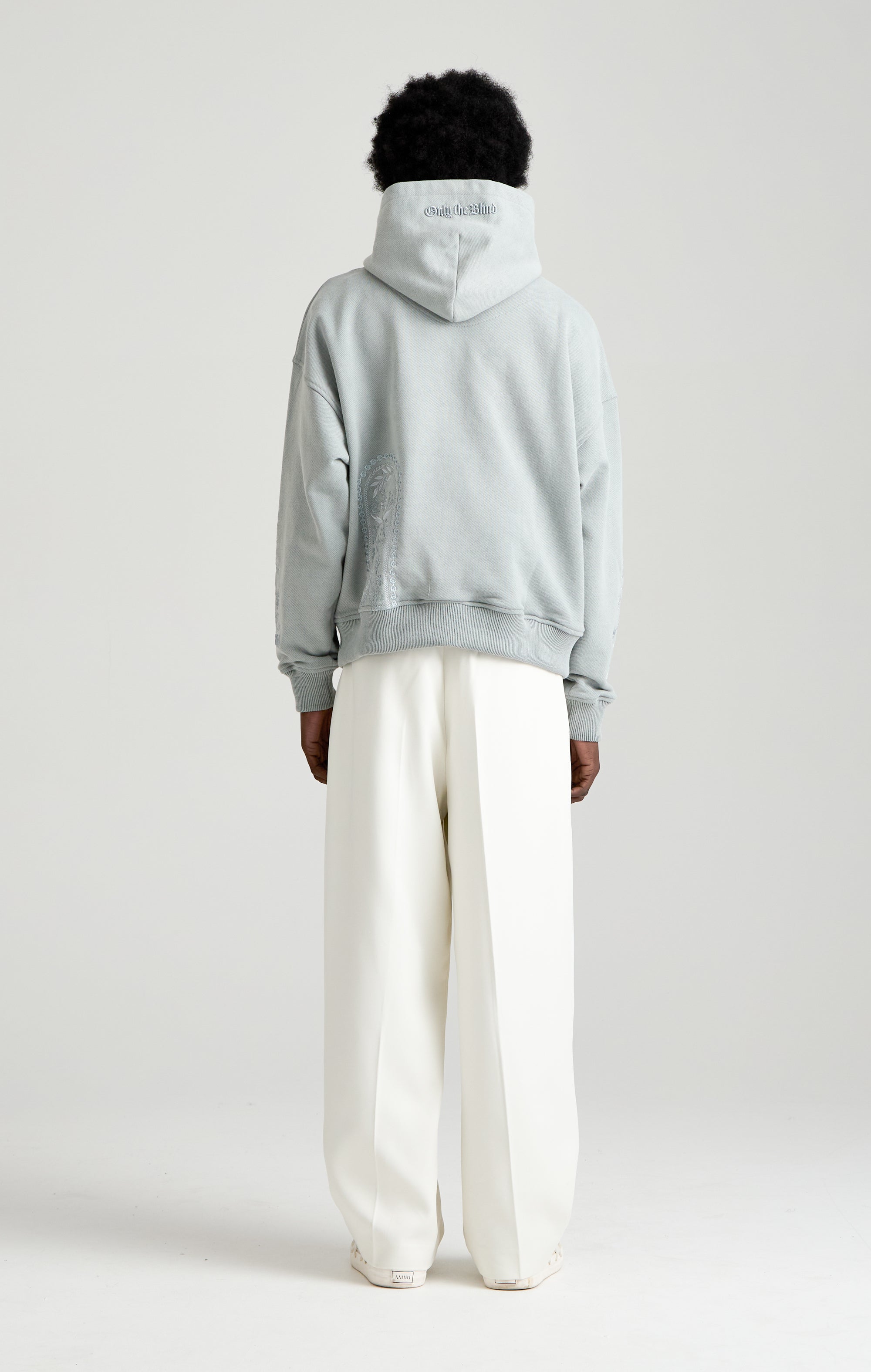 TAPESTRY IN GREY HOOD