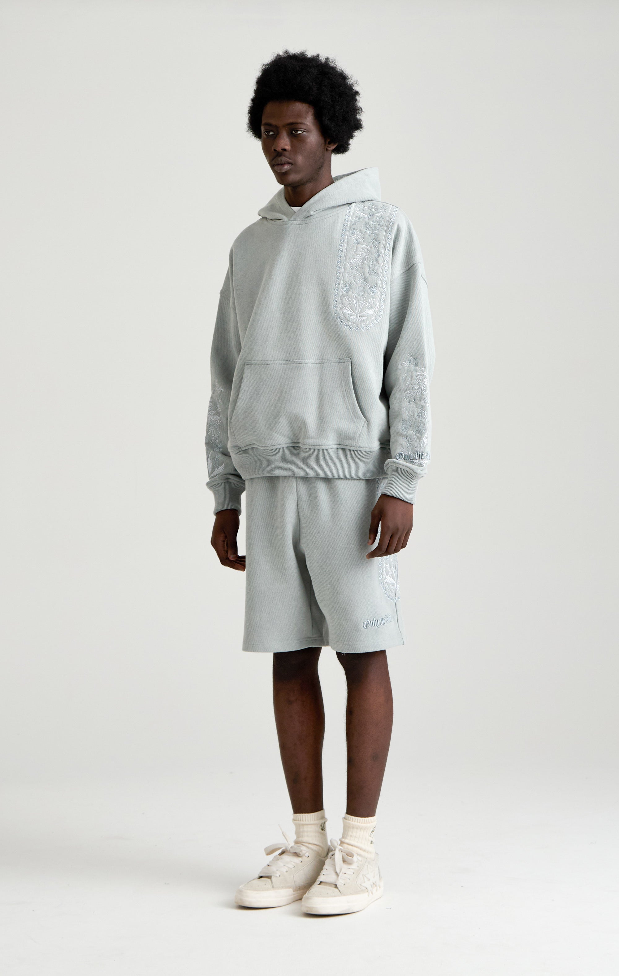 TAPESTRY IN GREY HOOD