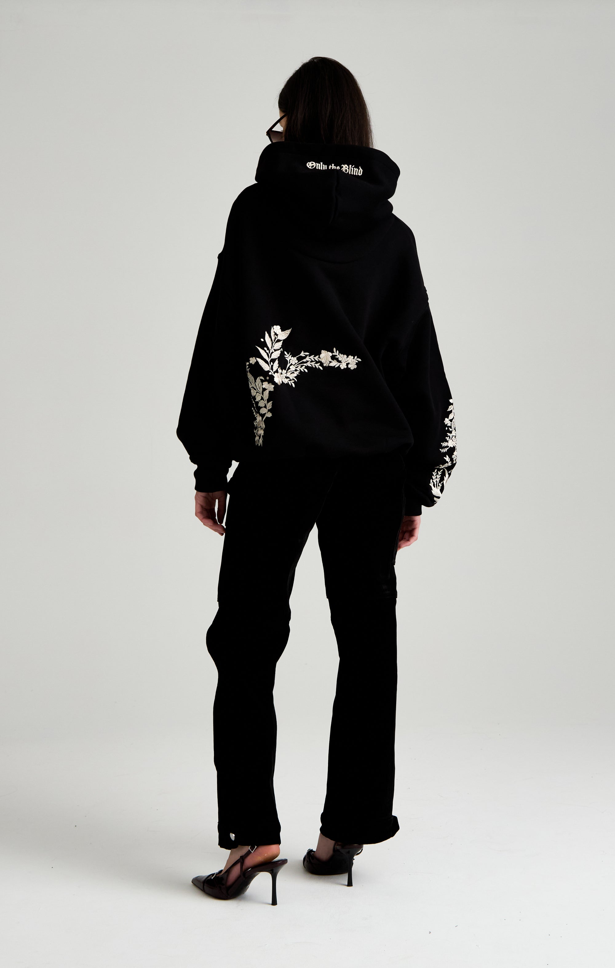 WHISPERS IN THE BLOOM HOOD