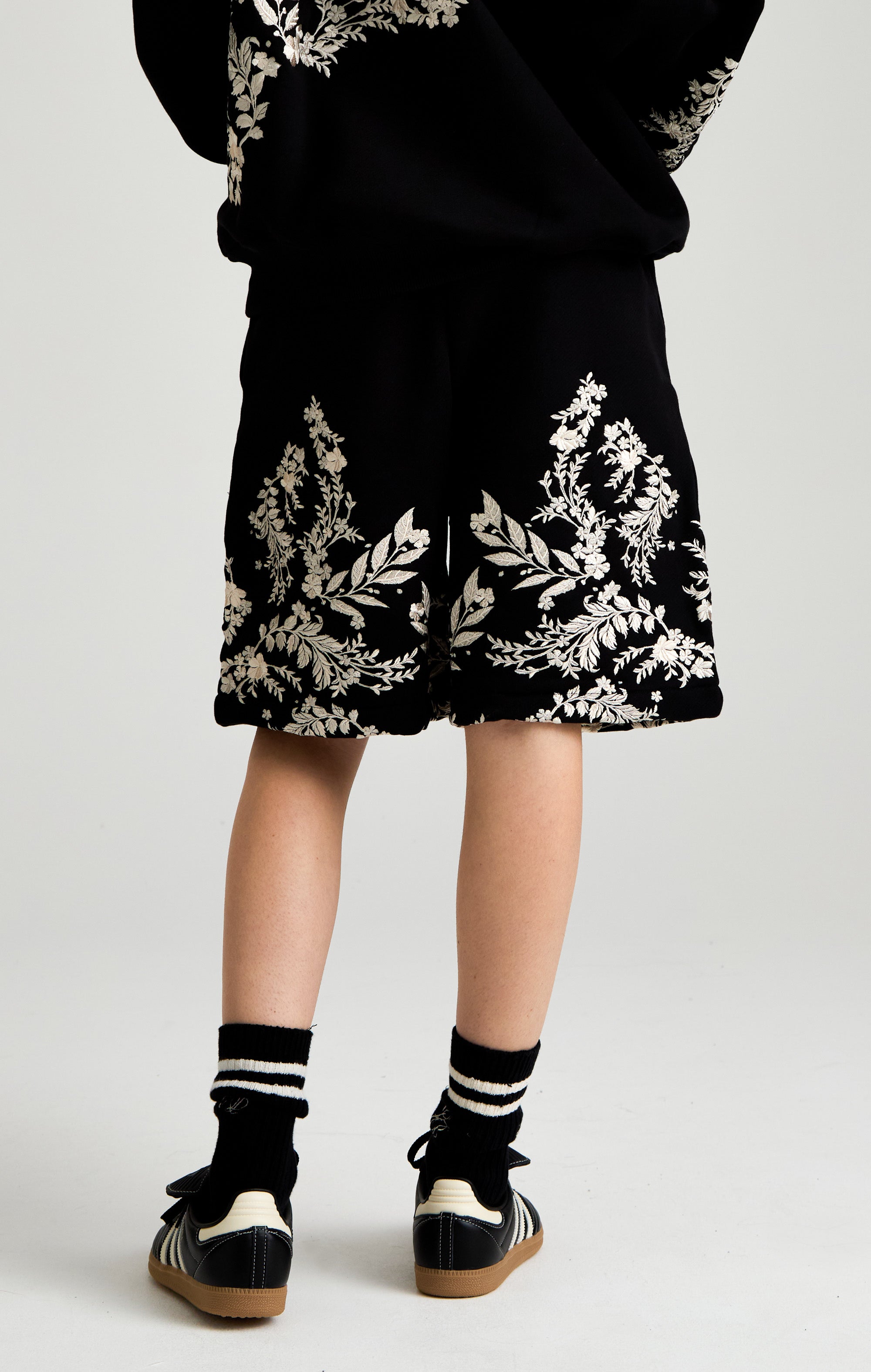 WHISPERS IN THE BLOOM SHORT