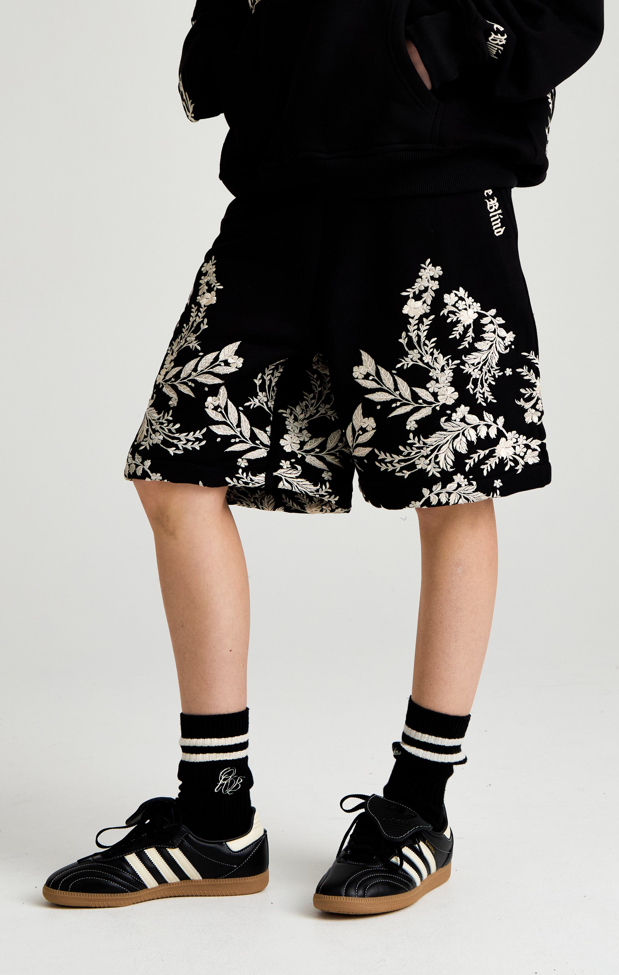 WHISPERS IN THE BLOOM SHORT